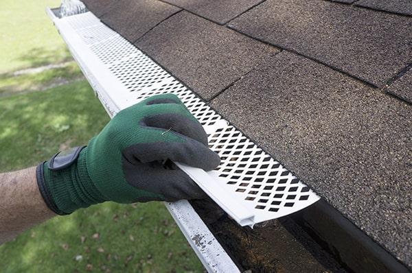 gutter guards create a barrier that deters pests like birds, rodents, and insects from nesting in your gutters